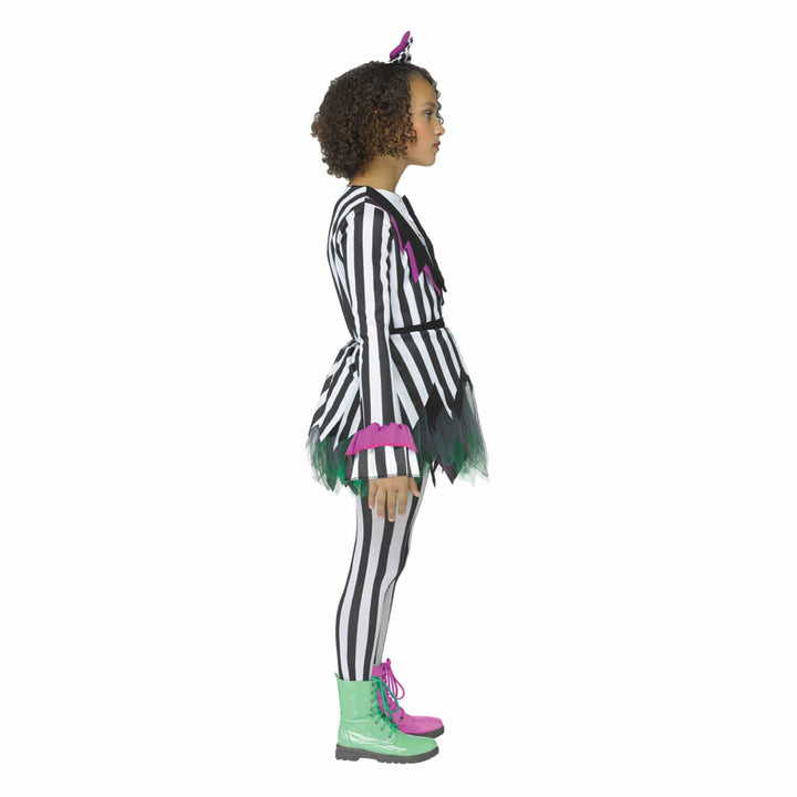 A child model shown in profile wearing a black and white striped costume with green and pink accents, black-and-white striped tights, green and pink lace-up boots, and hair bow, on a plain white background.