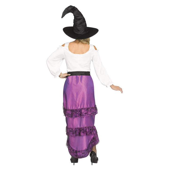 A woman modeling a witch costume from the back, featuring a black pointed hat, a white long-sleeve top, and a purple ruffled skirt with a black waistband.