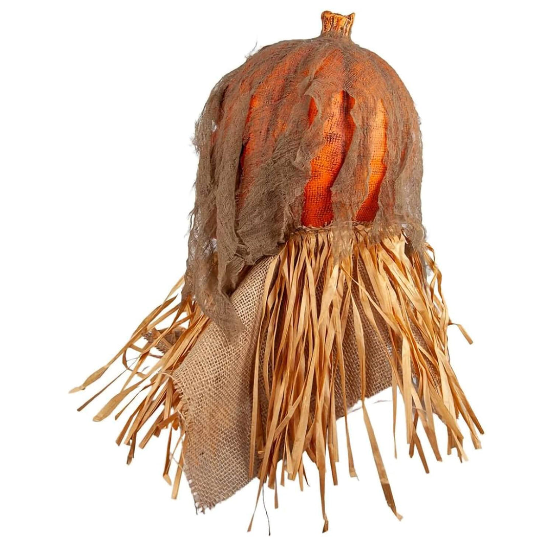 A decorative scarecrow Halloween decoration with a brown burlap-textured body, orange glowing interior, and long straw hair, shown on a plain white background.