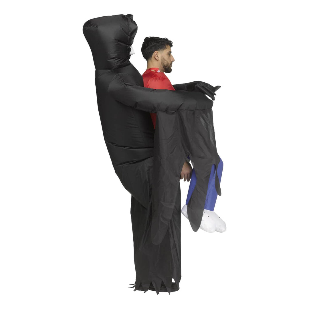 Right side profile of a man wearing a Scream inflatable carry me costume