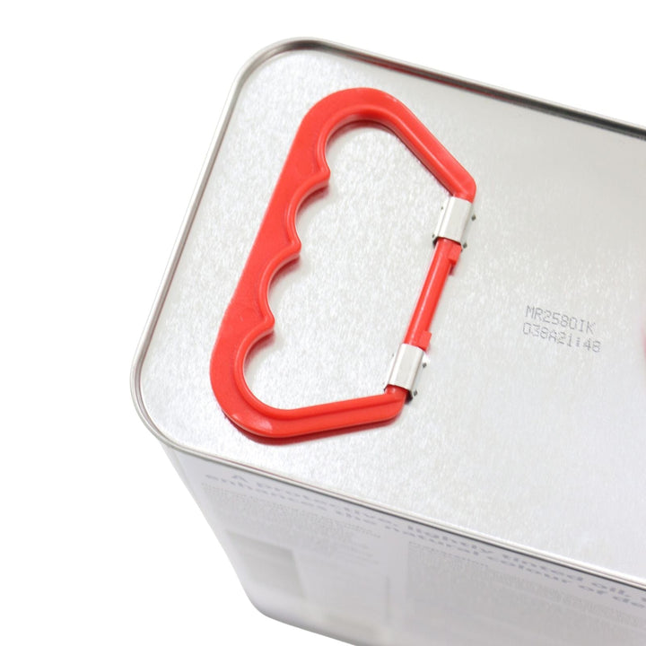 Red carry handle attached to a white container with a textured surface
