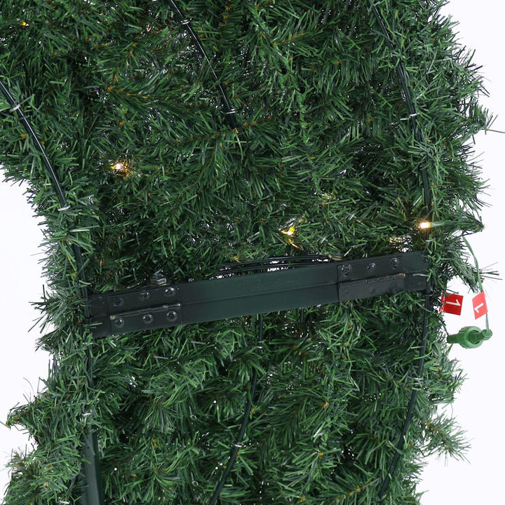 back view of moon shaped tree with metal stand and light connectors