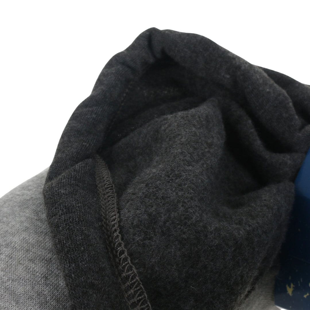 close up of fleece lining in hood on dark grey travel neck pillow