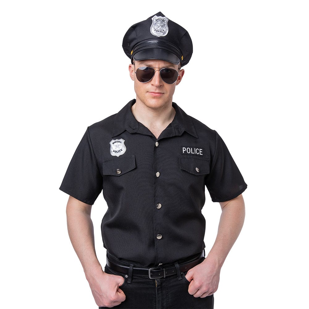 Man wearing a black police officer fancy dress costume with silver badge, dark sunglasses, and a cap adorned with a metallic emblem.