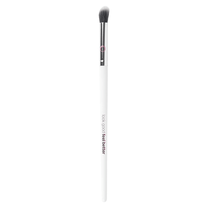 angled blending brush featuring white handle and pink logo