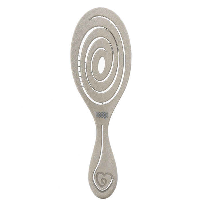 reverse shot of grey hair brush featuring floral pattern with loveheart handle and hodge and hodge handle