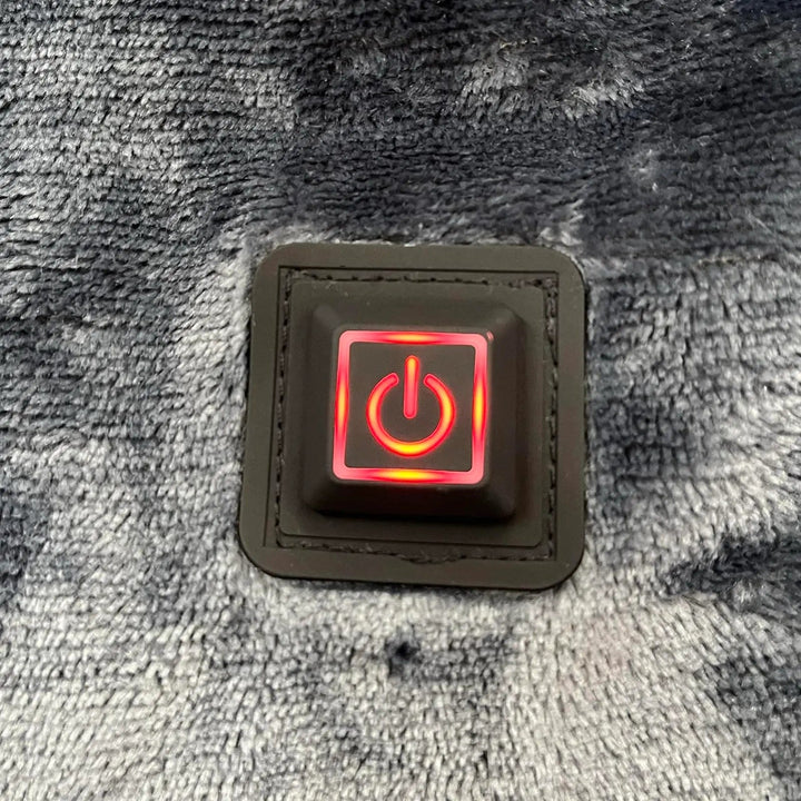 Red power button heat setting on heated hoodie 