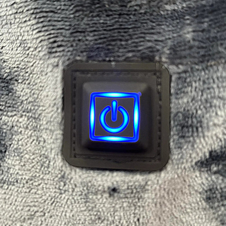 Blue power button heat setting on heated hoodie