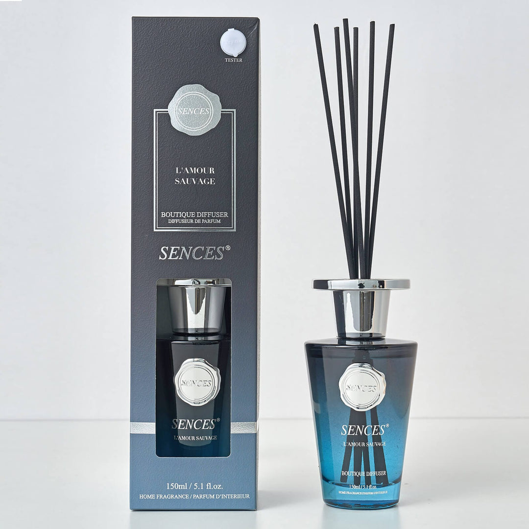 Sences L'Amour Sauvage reed diffuser bottle and packaging on a white background