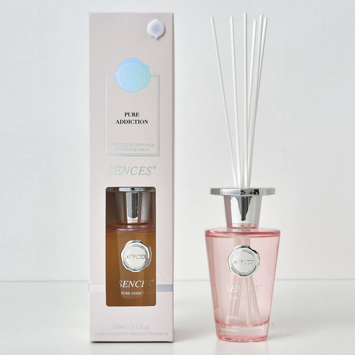 Sences Pure Addiction reed diffuser bottle with packaging on a white background