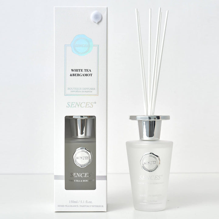 Sences White Tea &amp; Bergamot Reed diffuser with frasted white glass bottle, white reeds and gift box packaging