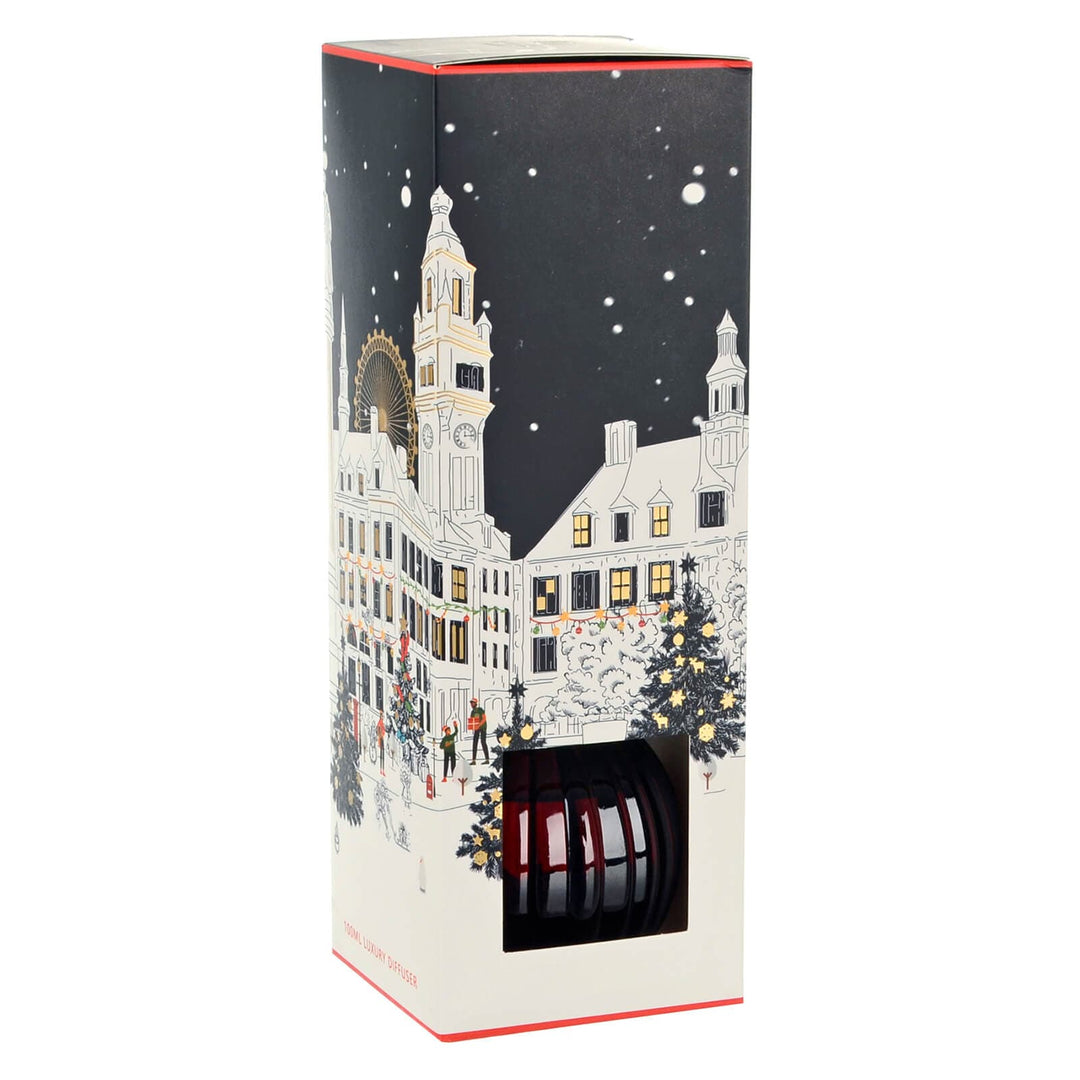 Christmas reed diffuser packaging with town snow scene