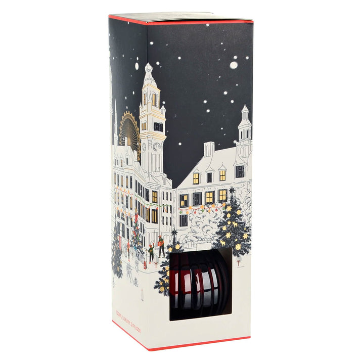 Christmas reed diffuser packaging with town snow scene