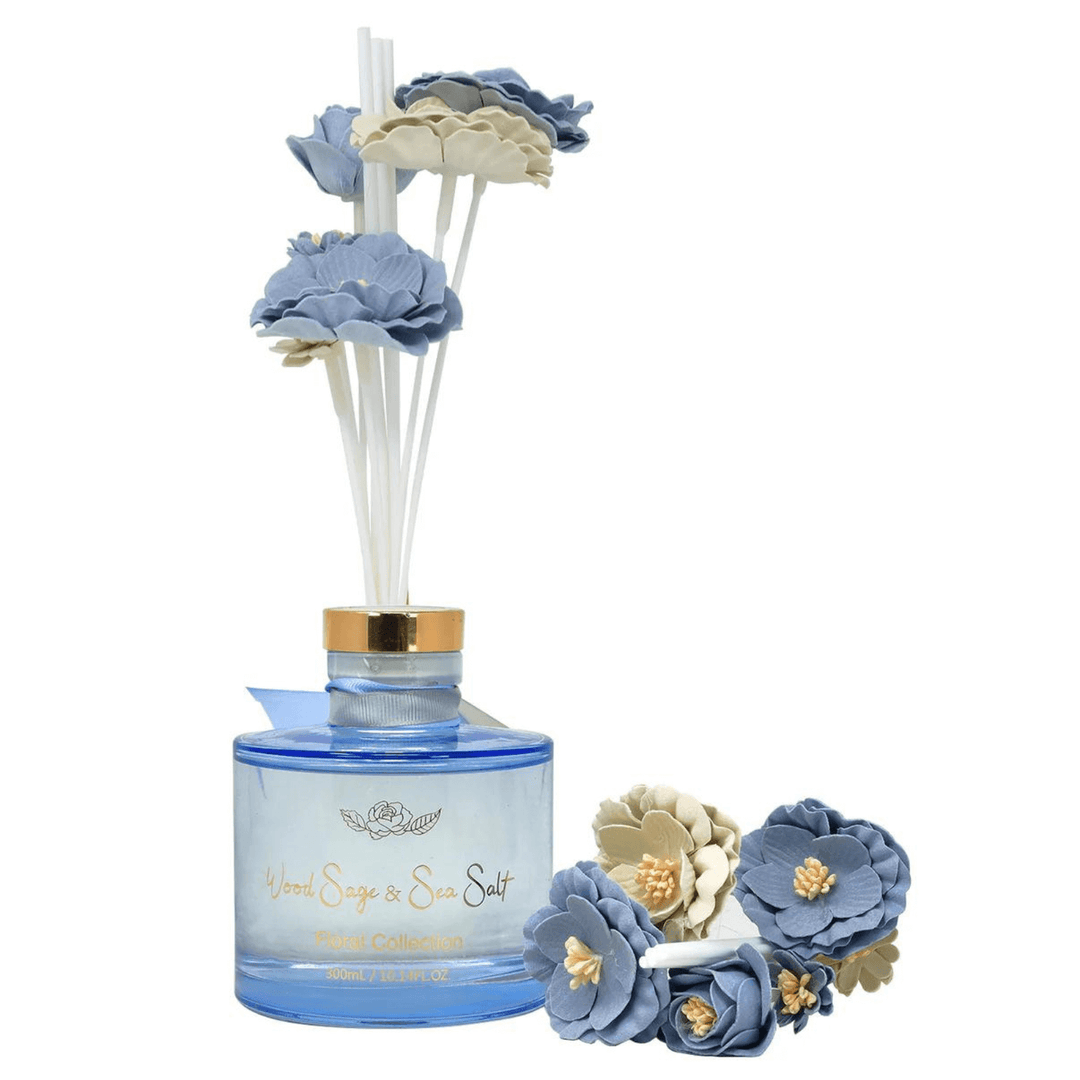 blue wood sage & sea salt diffuser bottle white white and blue faux flowers