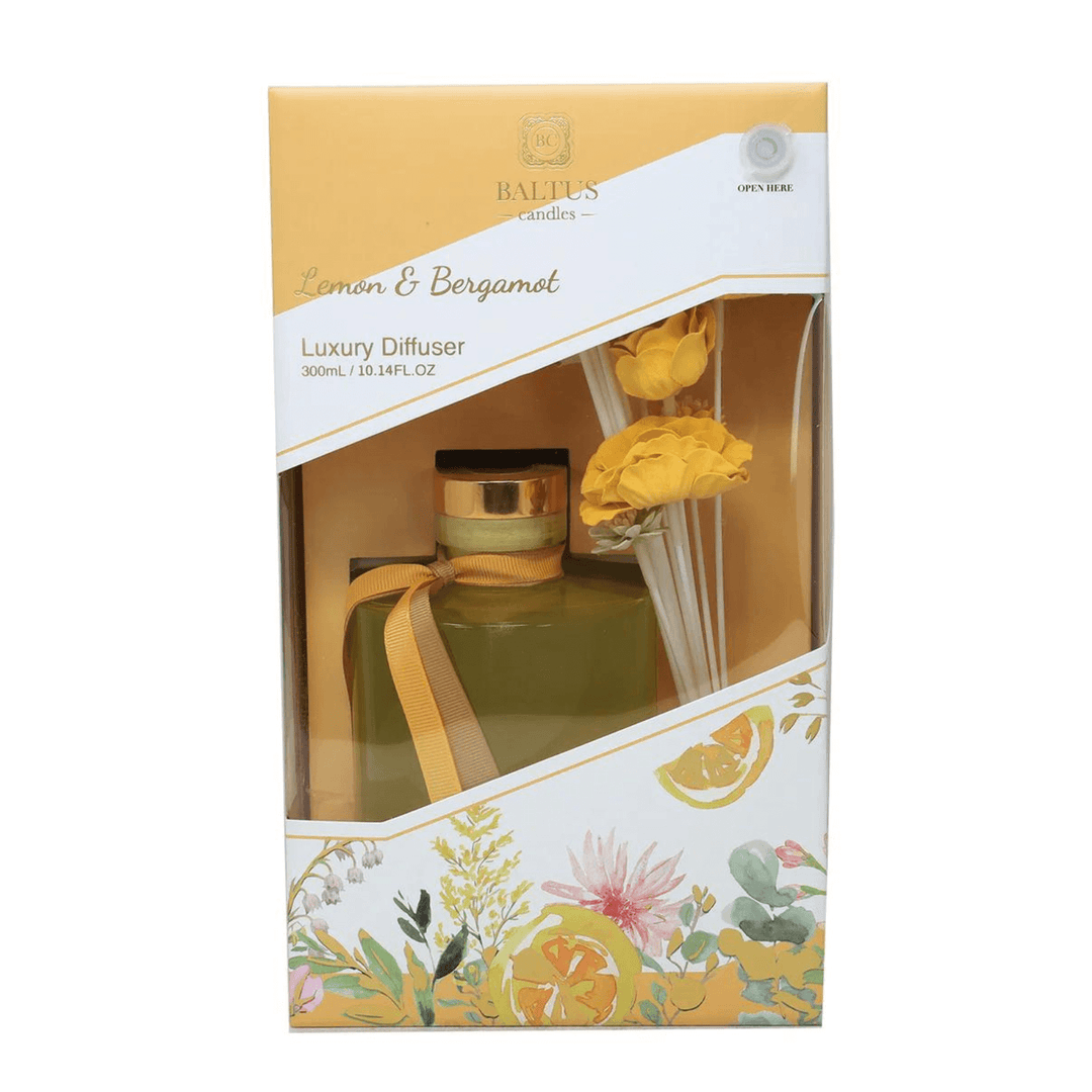 lemon & bergamot reed diffuser box packaging with orange details & floral patterns