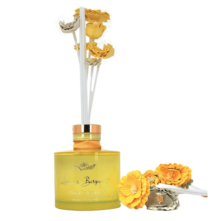 lemon & bergamot reed diffuser with yellow and white coloured faux flowers and white reeds