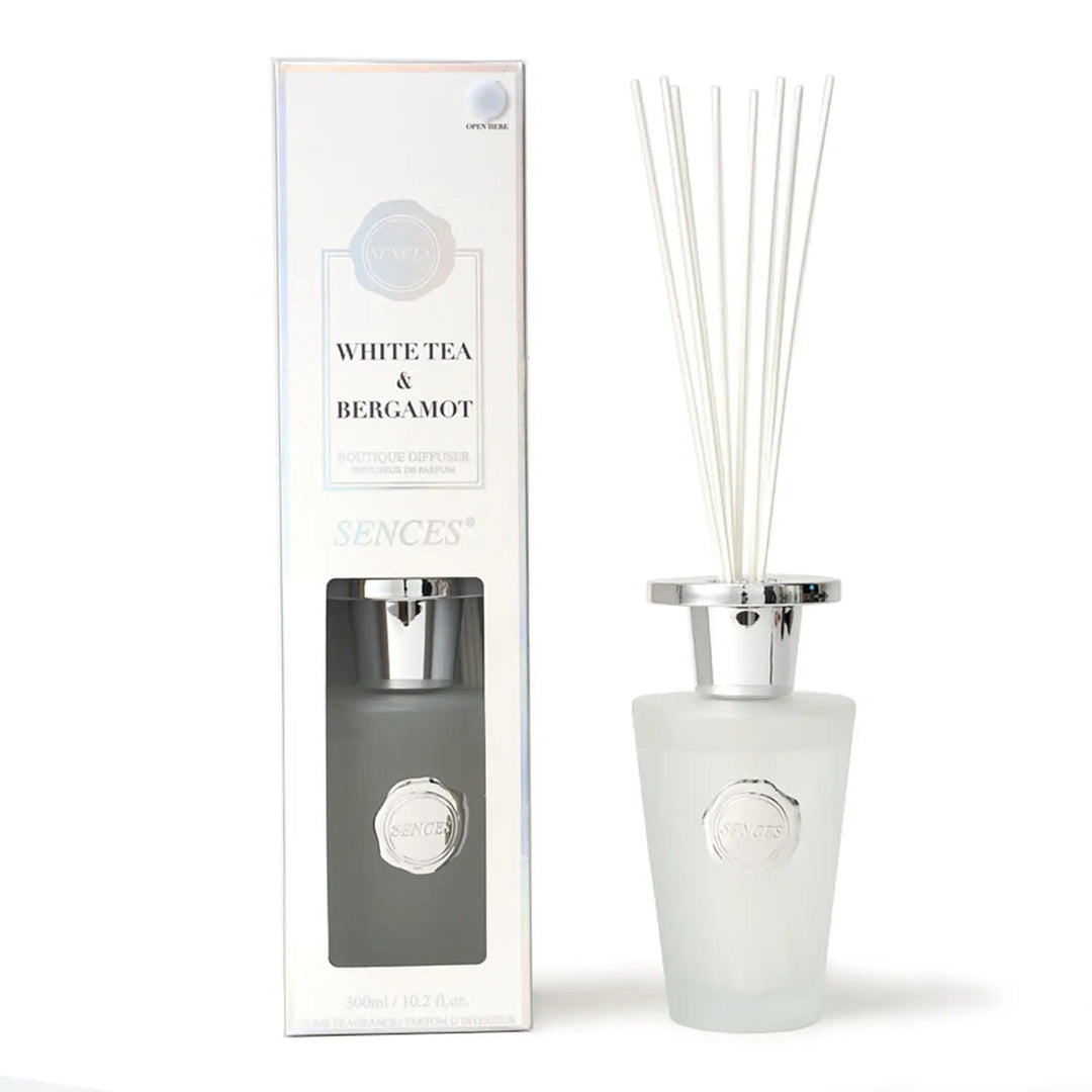 White tea and bergamot scented diffuser in white with silver top bottle and white reeds