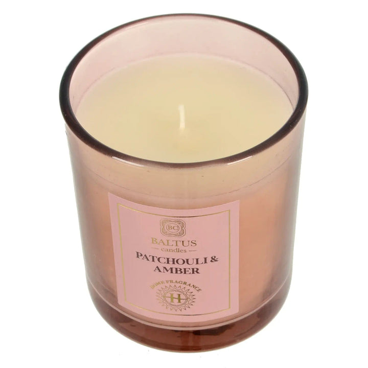 Single wick patchouli & amber centre candle in a pink coloured glass jar