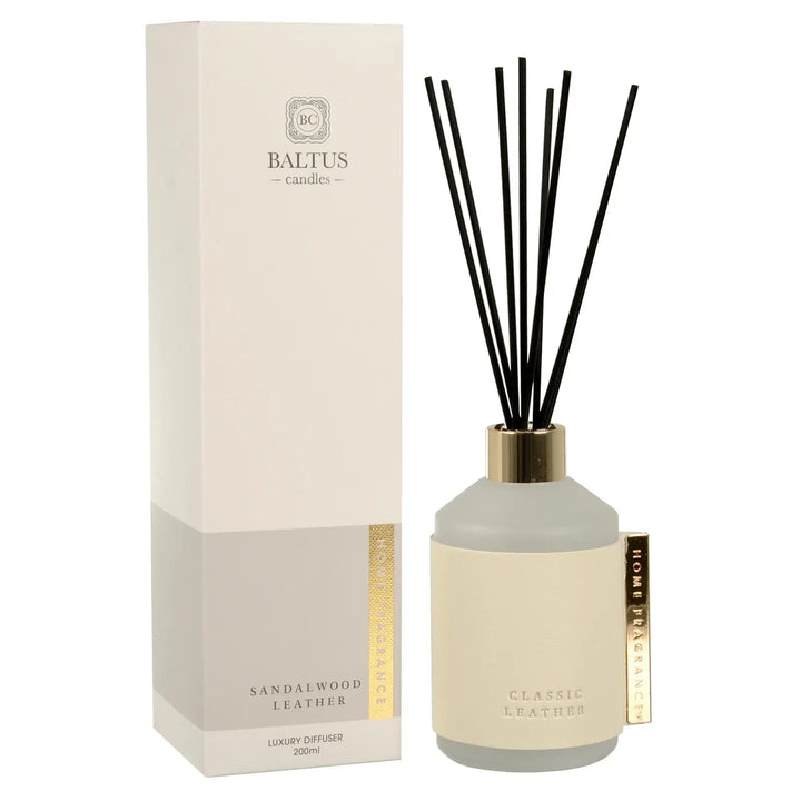 Sandalwood scented Classic Leather reed diffuser with gold tone clip and top, black reeds and box packaging