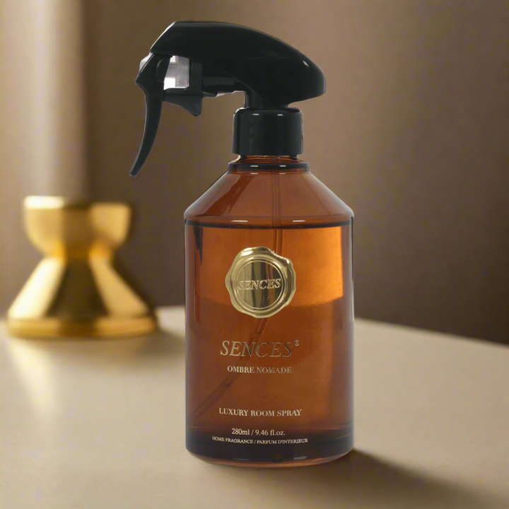 ombre nomade scented room spray in brown glass bottle with gold brand and product details