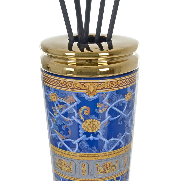 Decorative diffuser with blue and gold floral and lead Renaissance design on a white background