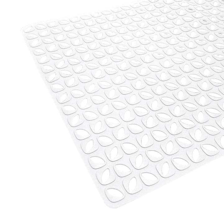 White bath mat with geometric tile pattern