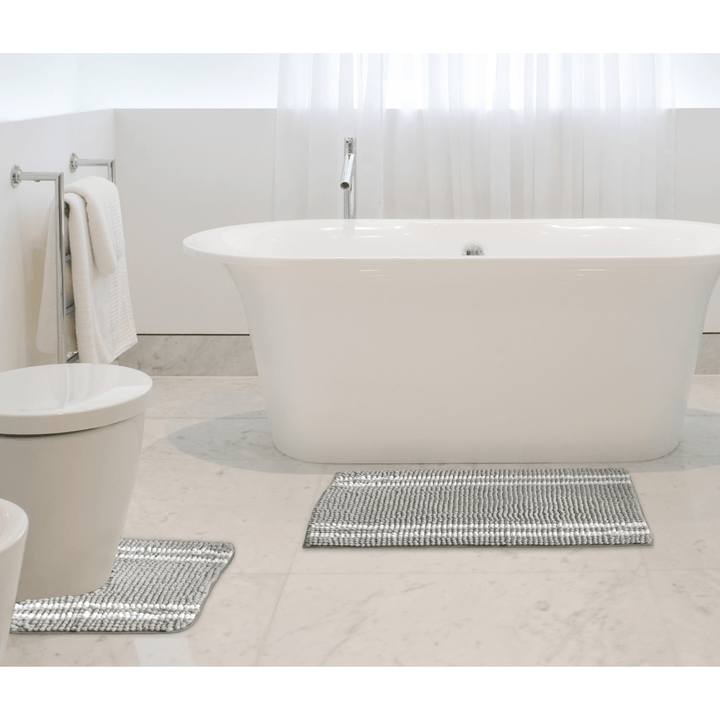 matching grey stripe bath mat and pedestal mat set in bathroom setting