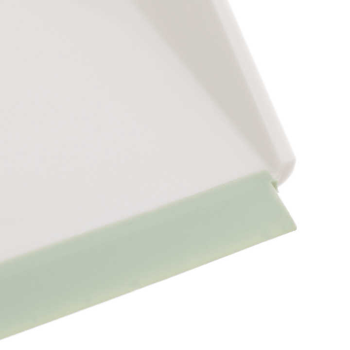 detail shot of rubber green edge on dustpan