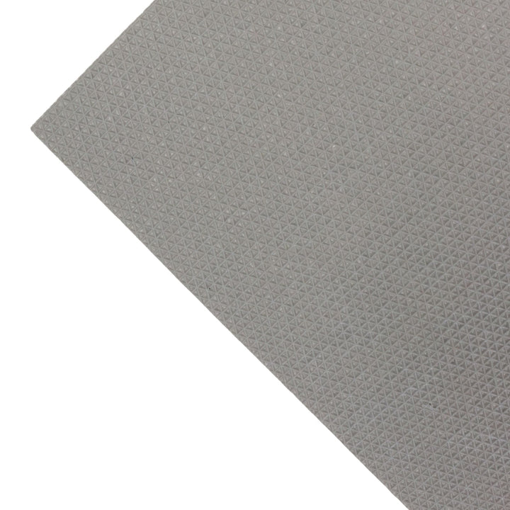 A close-up of reverse door mat side - grey textured material sample with a repeating geometric pattern, shown against a white background.