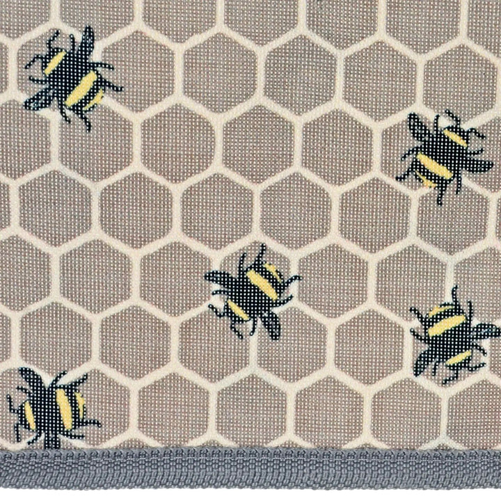 Close up of bumblebees and honeycomb print on a cool bag