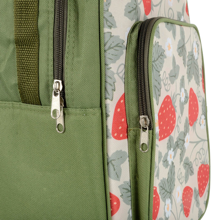 Close up of the zip fasteners on a green and strawberry pattern backpack cooler bag