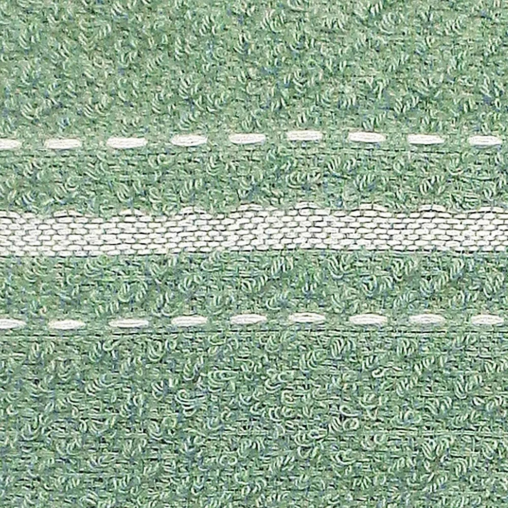 Close-up of a textured green tea towel with white striped stitching