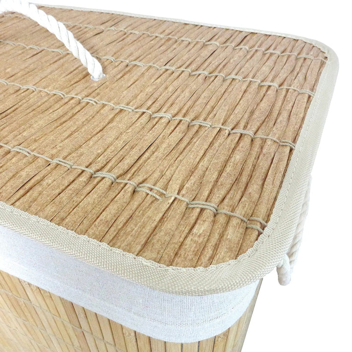 Close up detail of the rattan effect lid on a natural bamboo laundry hamper