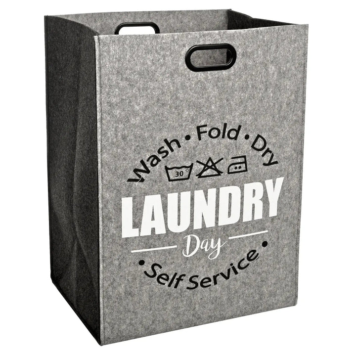 Grey felt laundry bag with wash fold dry laundry service text on the front