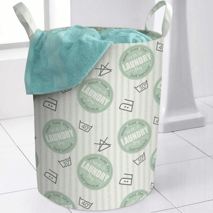 green laundry day self service pattern on laundry bag with teal towel inside