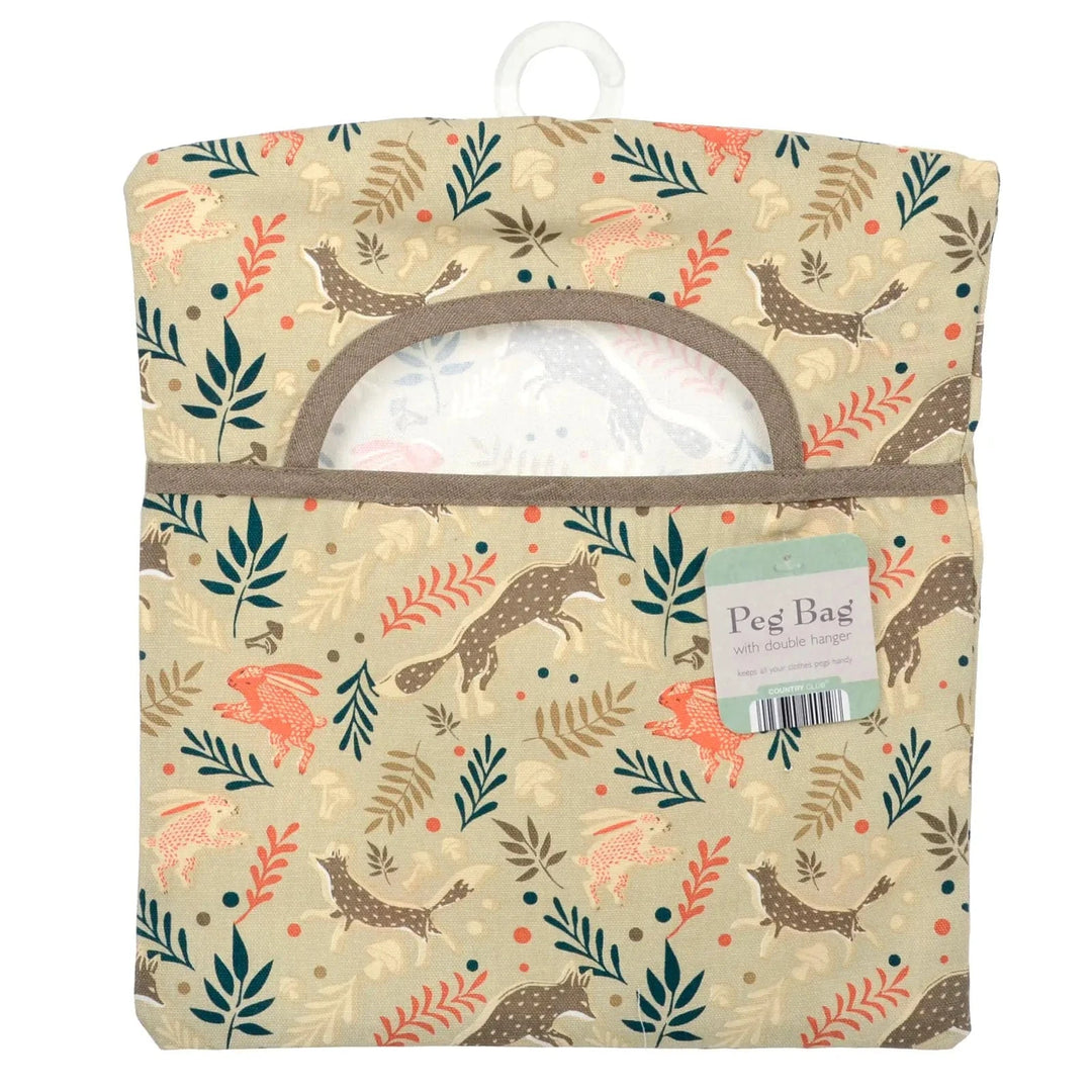 Peg bag with woodland creatures and leaf pattern on a beige background