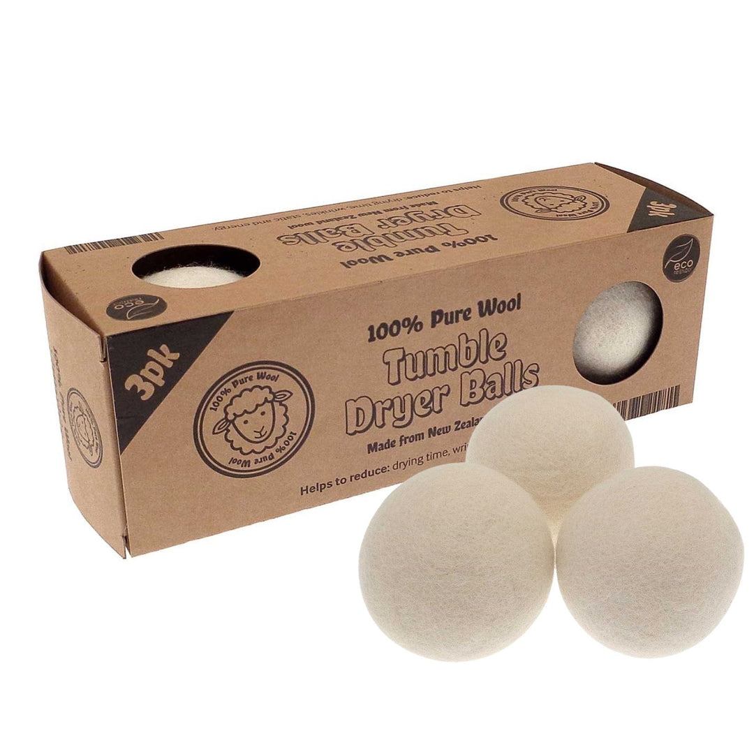 Box of 100% pure wool tumble dryer balls with three white balls in front on a white background