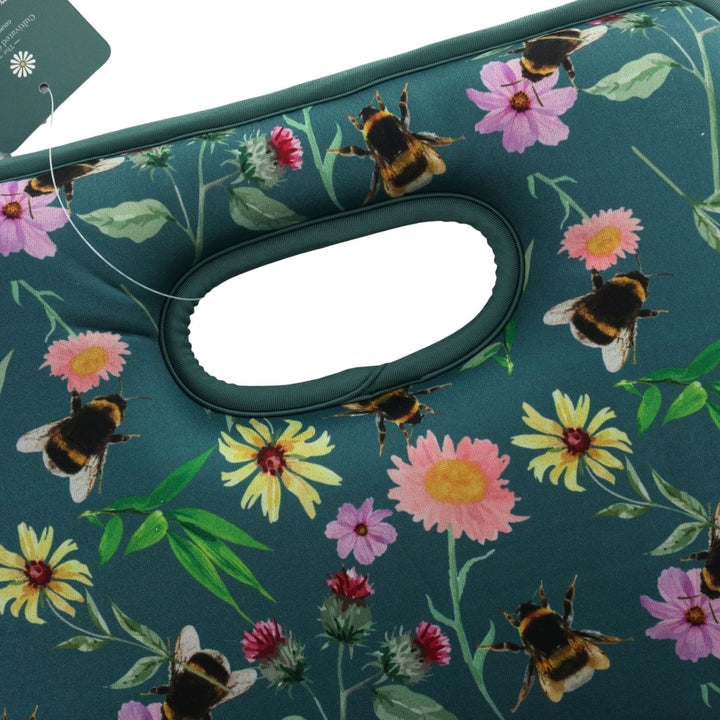 floral patterned kneeling mat with carry handle featuring green piping