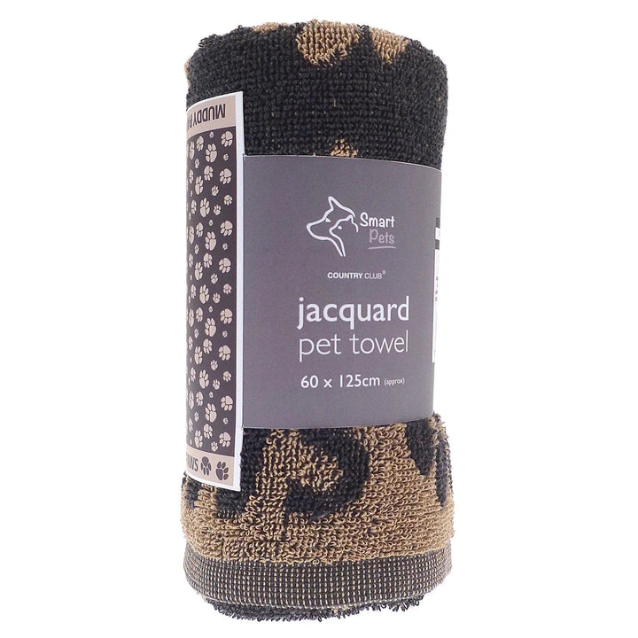 Woven jacquard pet towel in dark grey and tan paw print design in packaging