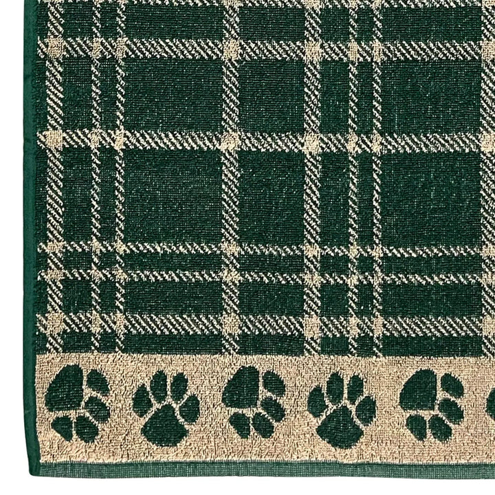 Close up detail of pet towel with green tartan and paw print design