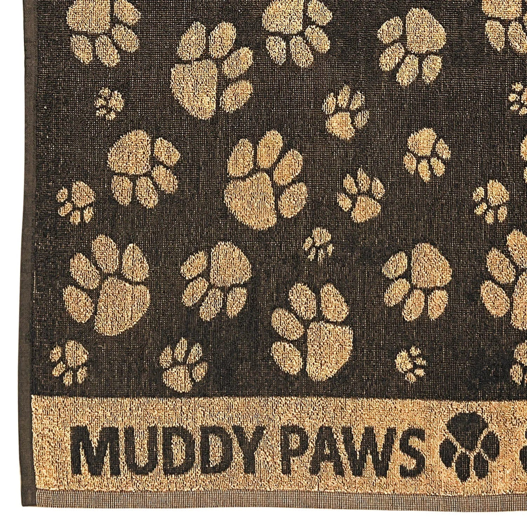 Close up detail of pet towel with dark grey and tan paw print design