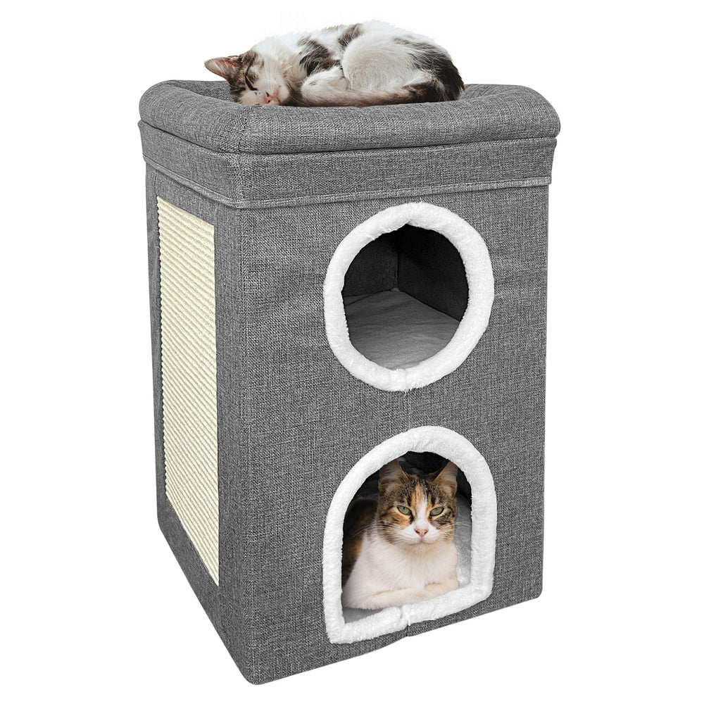 grey and white two story cat house with cat sleeping on top and cat inside bottom story with scratching board to the side