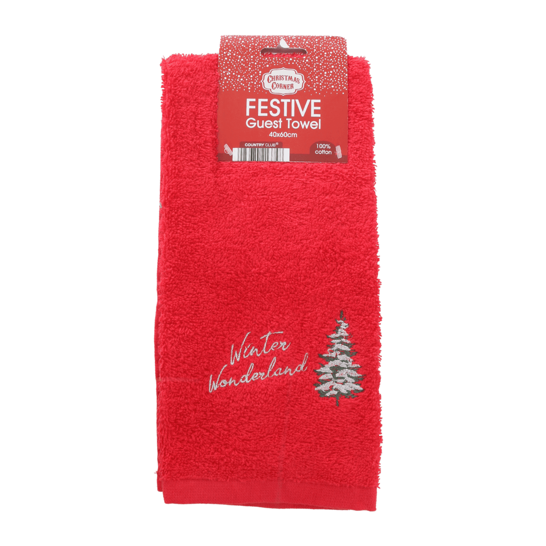 red guest hand towel featuring winter wonderland slogan with white and green christmas tree