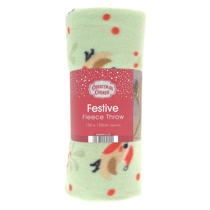 A rolled Christmas-themed fleece throw blanket in pale green with red polka dots and festive robins, wrapped in a red paper label that reads &