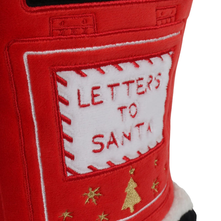 Close-up of a red plush door stop with a white patch reading “LETTERS TO SANTA” in red embroidery, plus small gold star and tree details, on a white background.