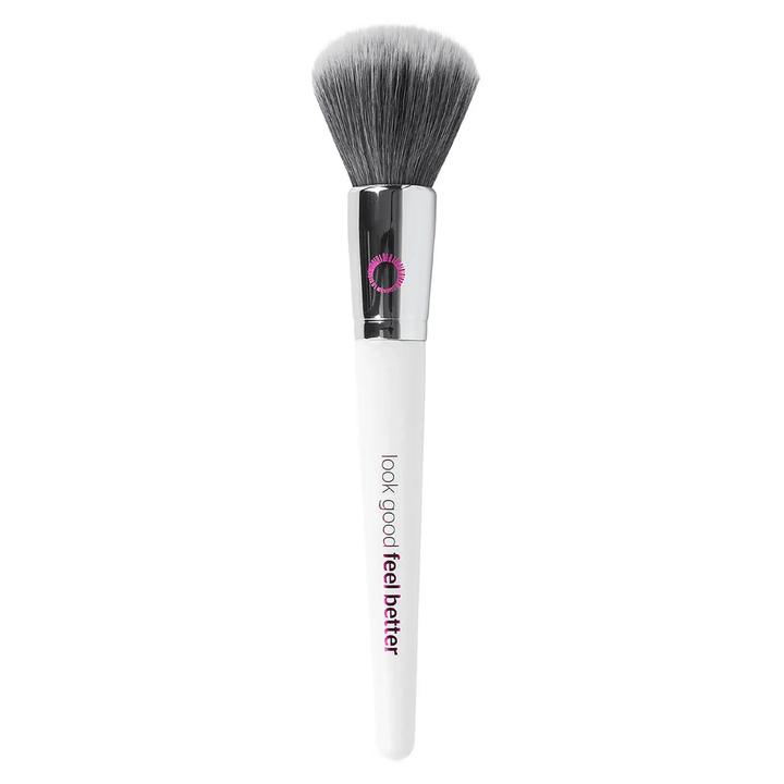 powder brush featuring sythenitic bristles and white handle