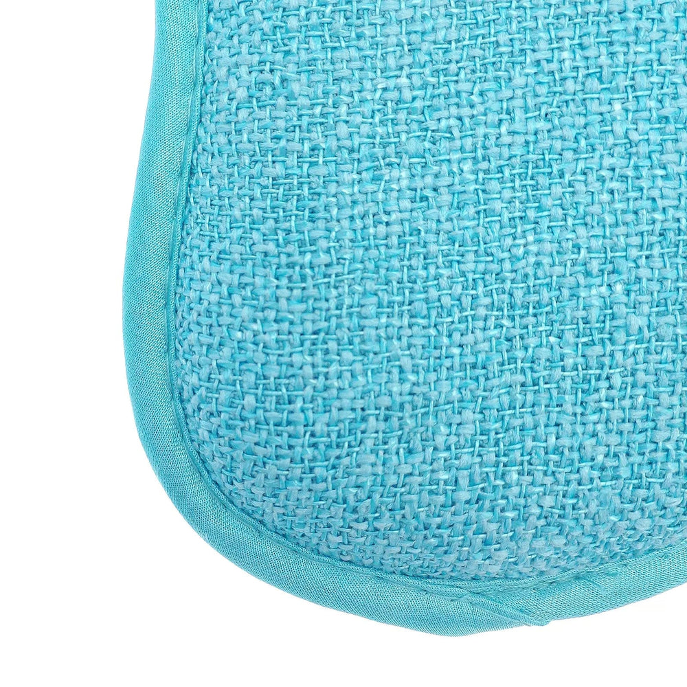 Close up of the scouring side of a blue microfibre padded scrubber