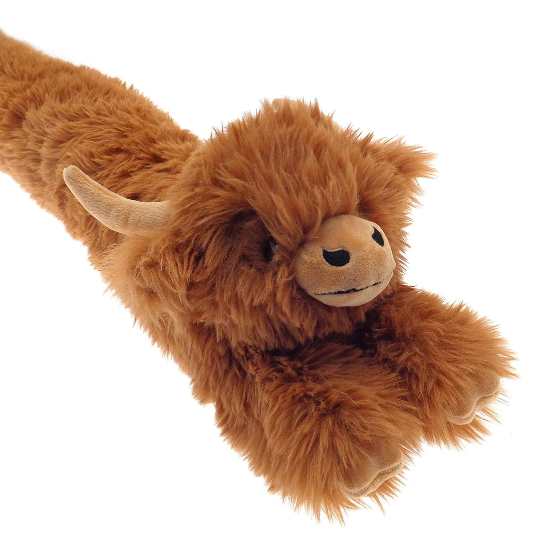 Close up of long haired highland cow novelty animal draught excluder