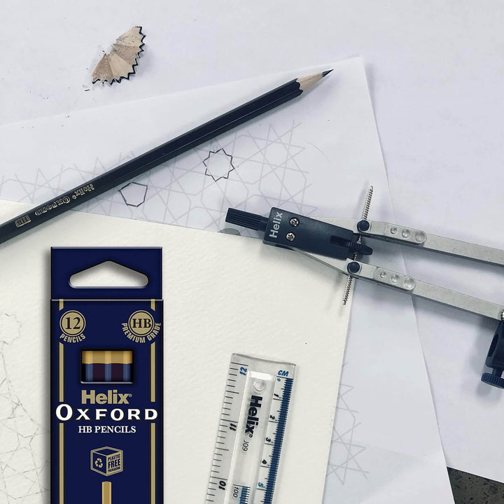 Helix Oxford HB pencils, packaging, ruler, and compasses on a white background