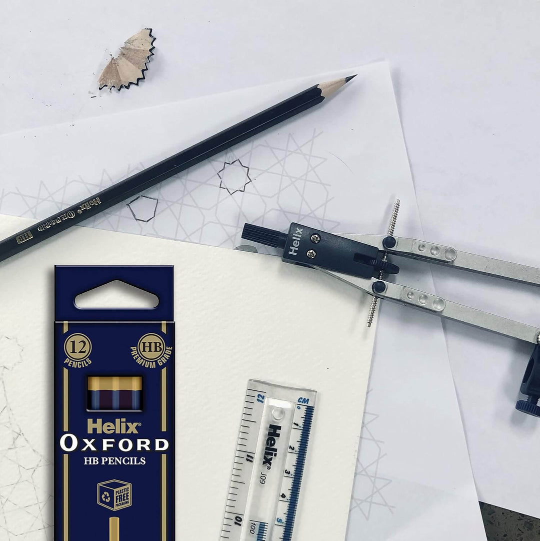 Helix Oxford HB pencils, packaging, ruler, and compasses on a white background